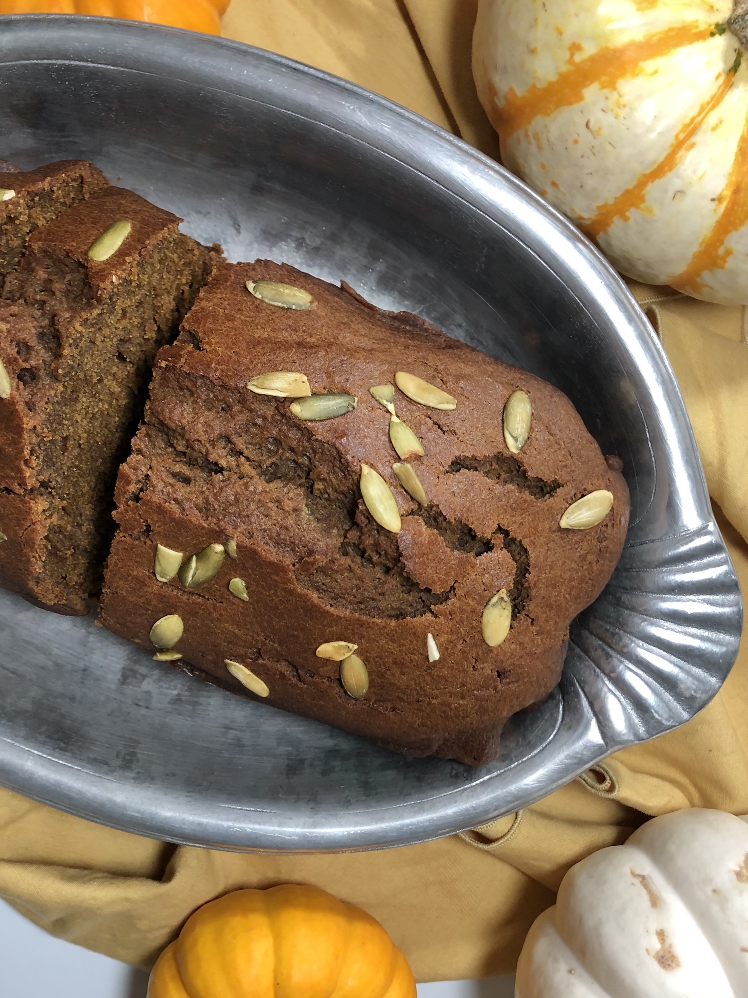 Pumpkin spice bread with pumpkins.