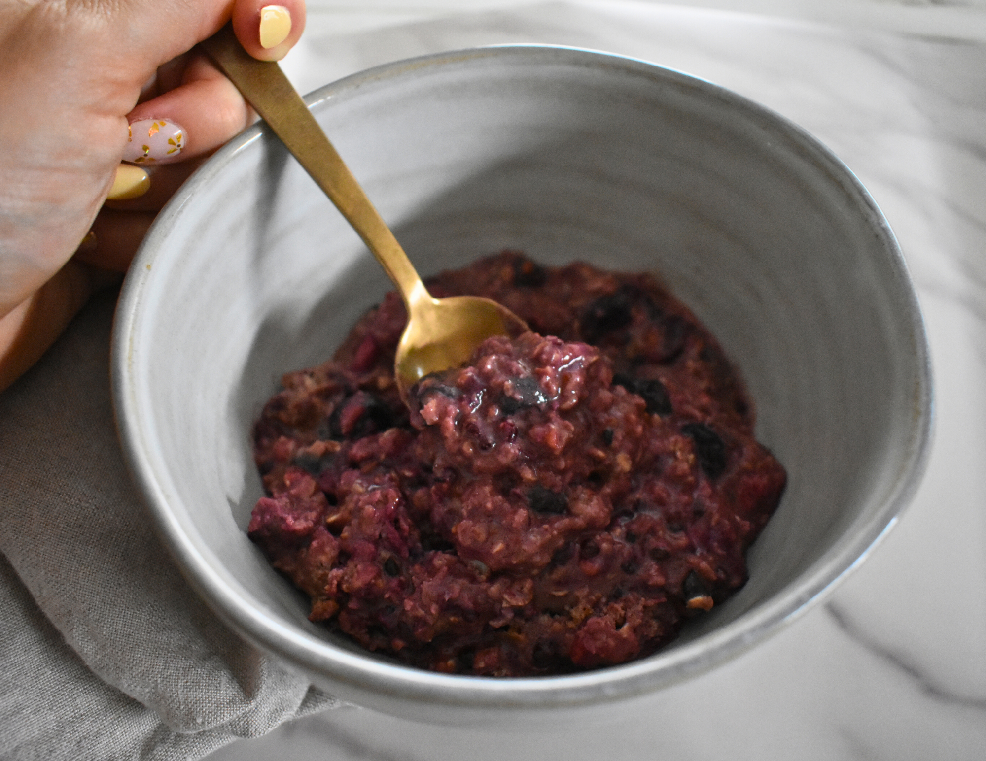 High-protein oatmeal with frozen berries, rolled oats, Fairlife nonfat milk, vanilla protein powder, PBfit. A 5-minute microwave recipe that makes a great pre-workout snack and healthy breakfast option.
